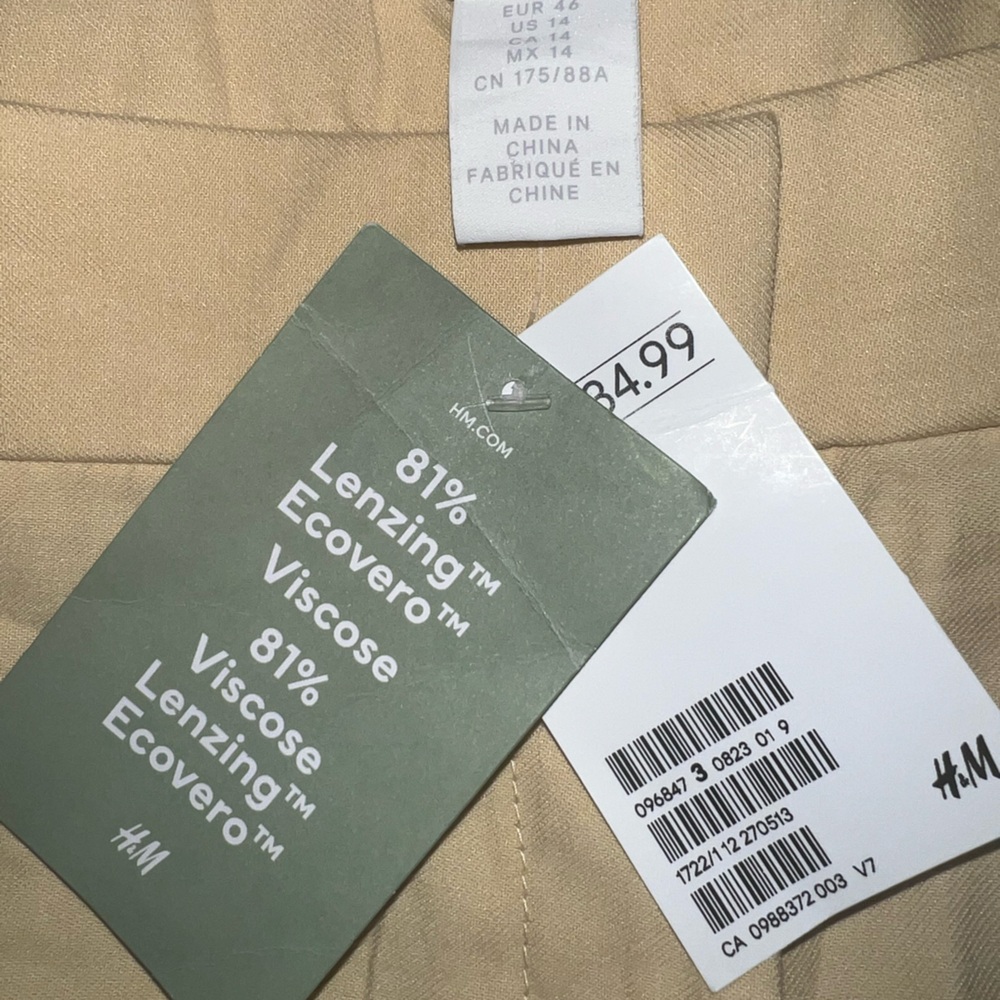 Light gold never worn women’s trousers